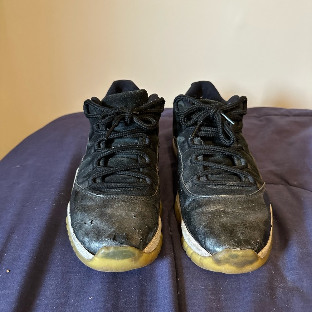 Jordan Black and Gold Sneakers